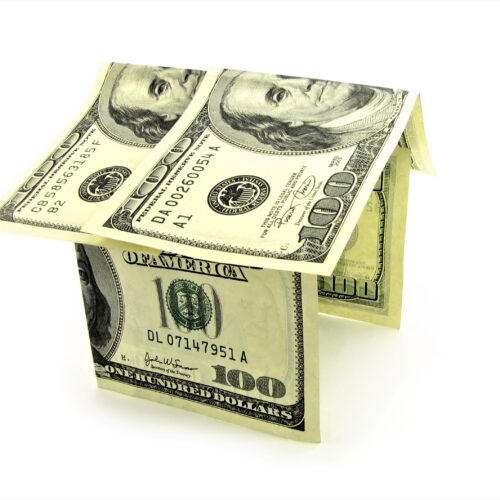 House from the money notes, isolated against the white backgroun House from the money notes, isolated against the white background.